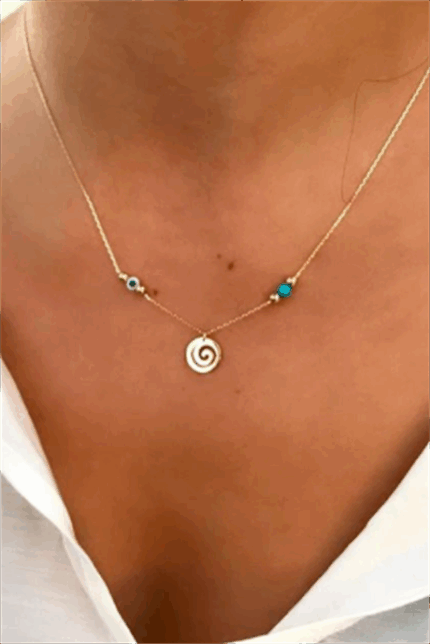 Altın Nazar Boncuklu Spiral Kolye Kuyumcu'nun Altın Kolye/Altın Nazar Boncuklu Kolye modelleri ve fiyatları olan altın takı ürünlerinden birisidir.